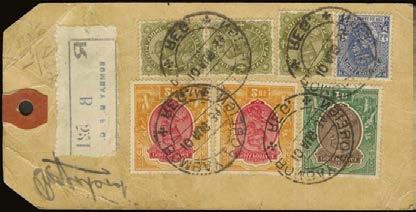 475 475 C 1934 Pair of two large parcel tags one registered, bearing multiple values to 2r. carmine & orange.