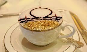 Photo stop with Emirates Palace hotel and driving by Ruler Palace). 2:30 PM: Uống trà Café với bánh ngọt có trộn vàng.
