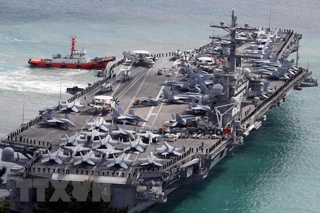 Phụ trang Mỹ đưa tàu sân bay USS Ronald Reagan tới Biển Đông tuần tra (TTXVN/VIETNAM+) 27/06/2018 07:53 GMT+7Bản in Tàu sân bay USS Ronald Reagan của Mỹ.